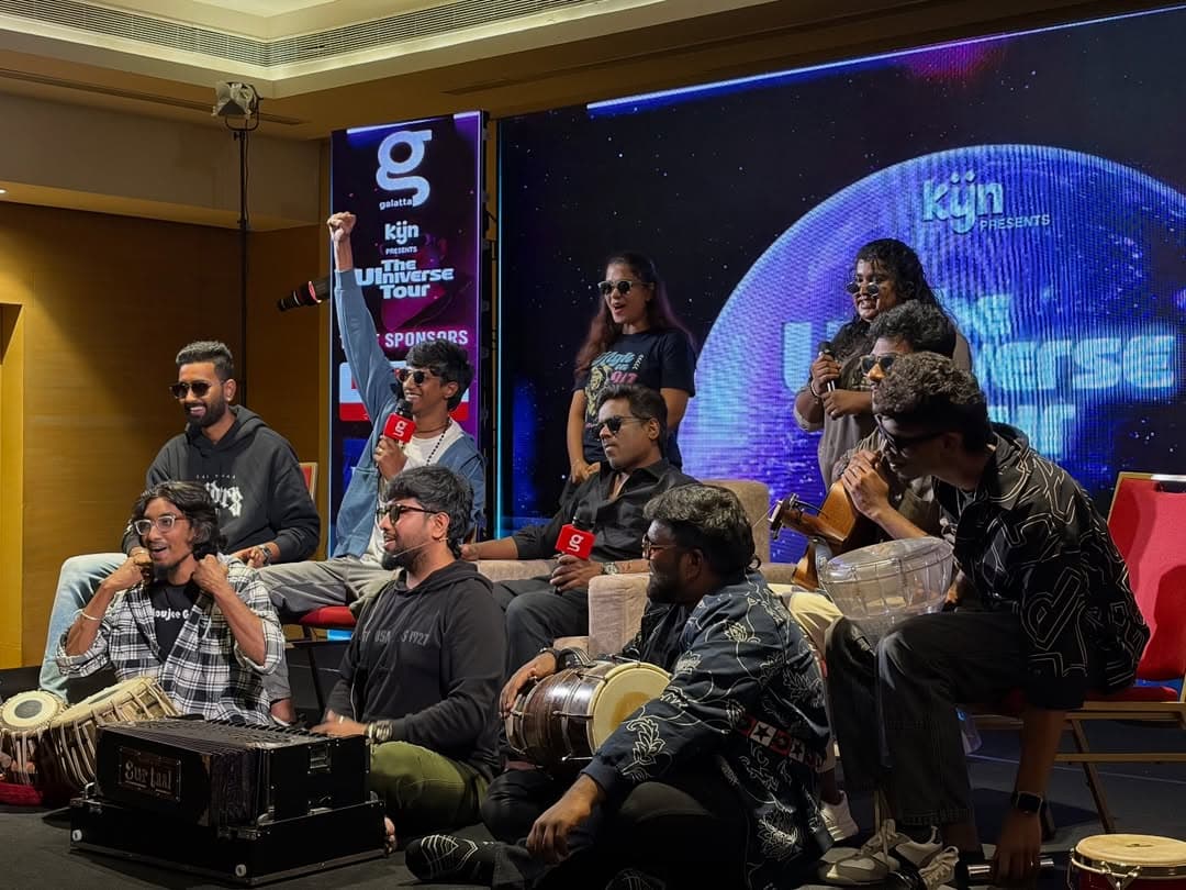 Office Gaana performing at The U1niverse Tour press event in front of a Galatta and KYN backdrop